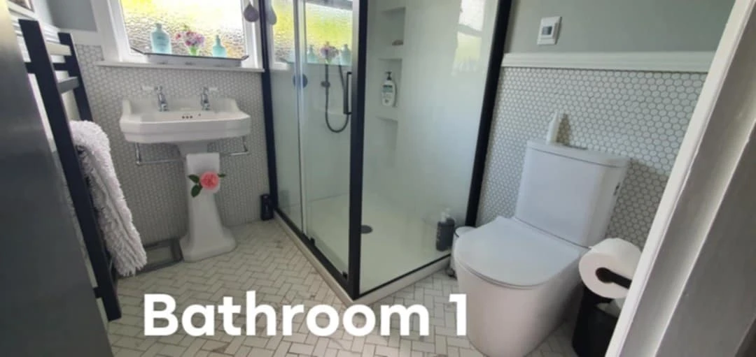 Bathroom with shower and vanity