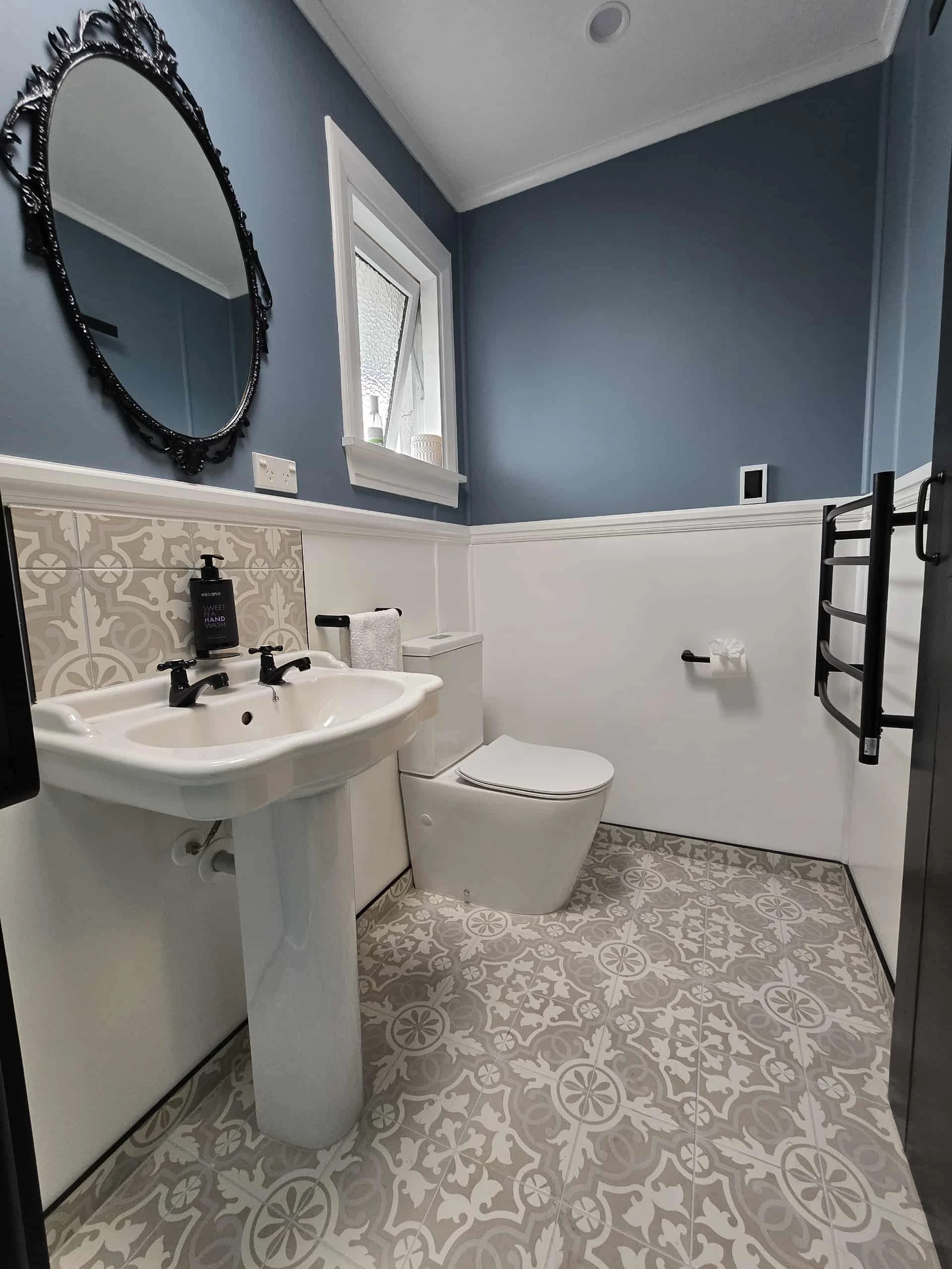 Bathroom vanity and toilet